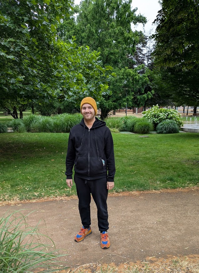 Patrik standing in Poděbrady park during rehabilitation