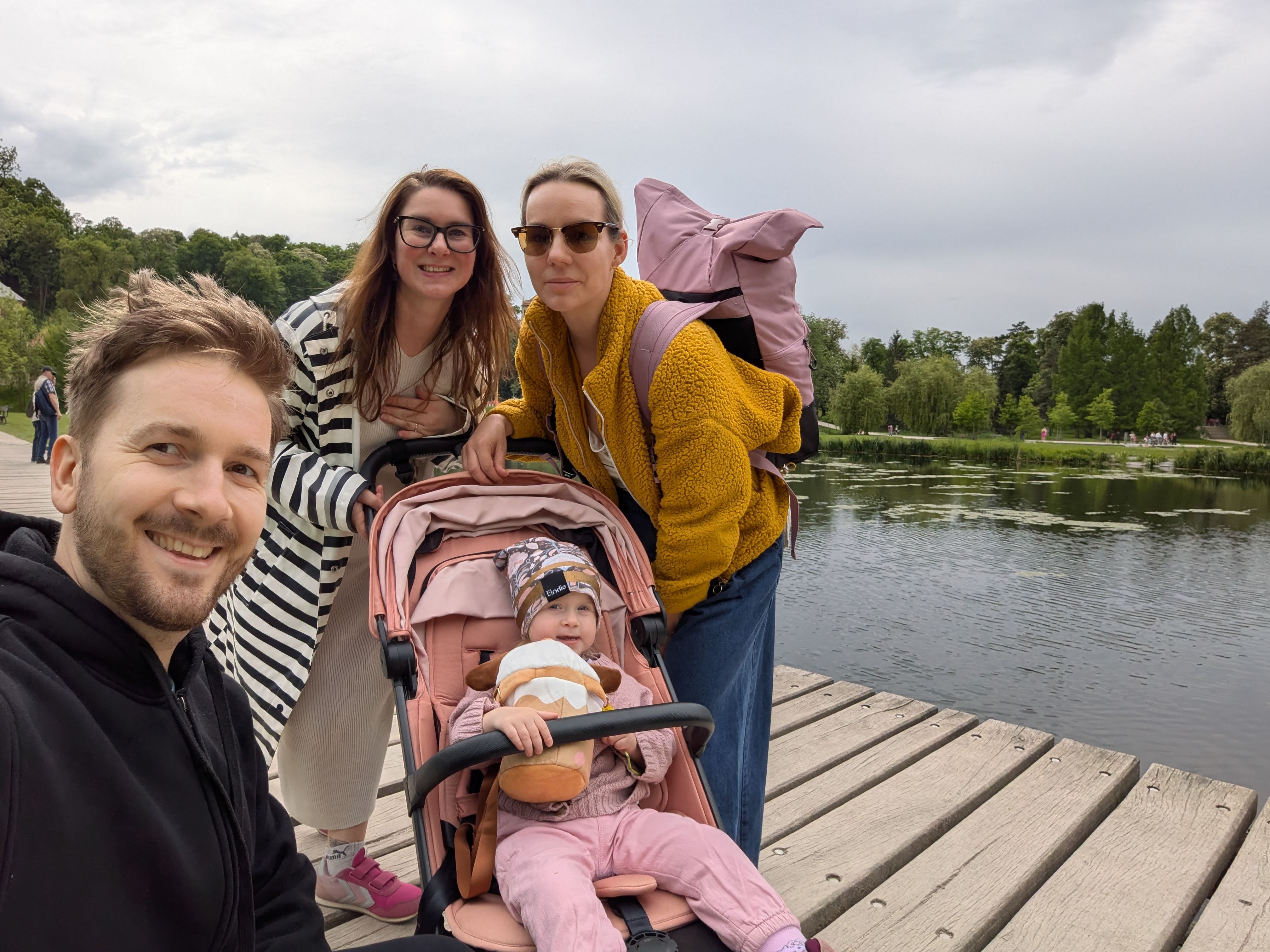 Patrik with wife, sister, and daughter by the lake
